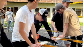Pictured are the trainees who are working on the marble run